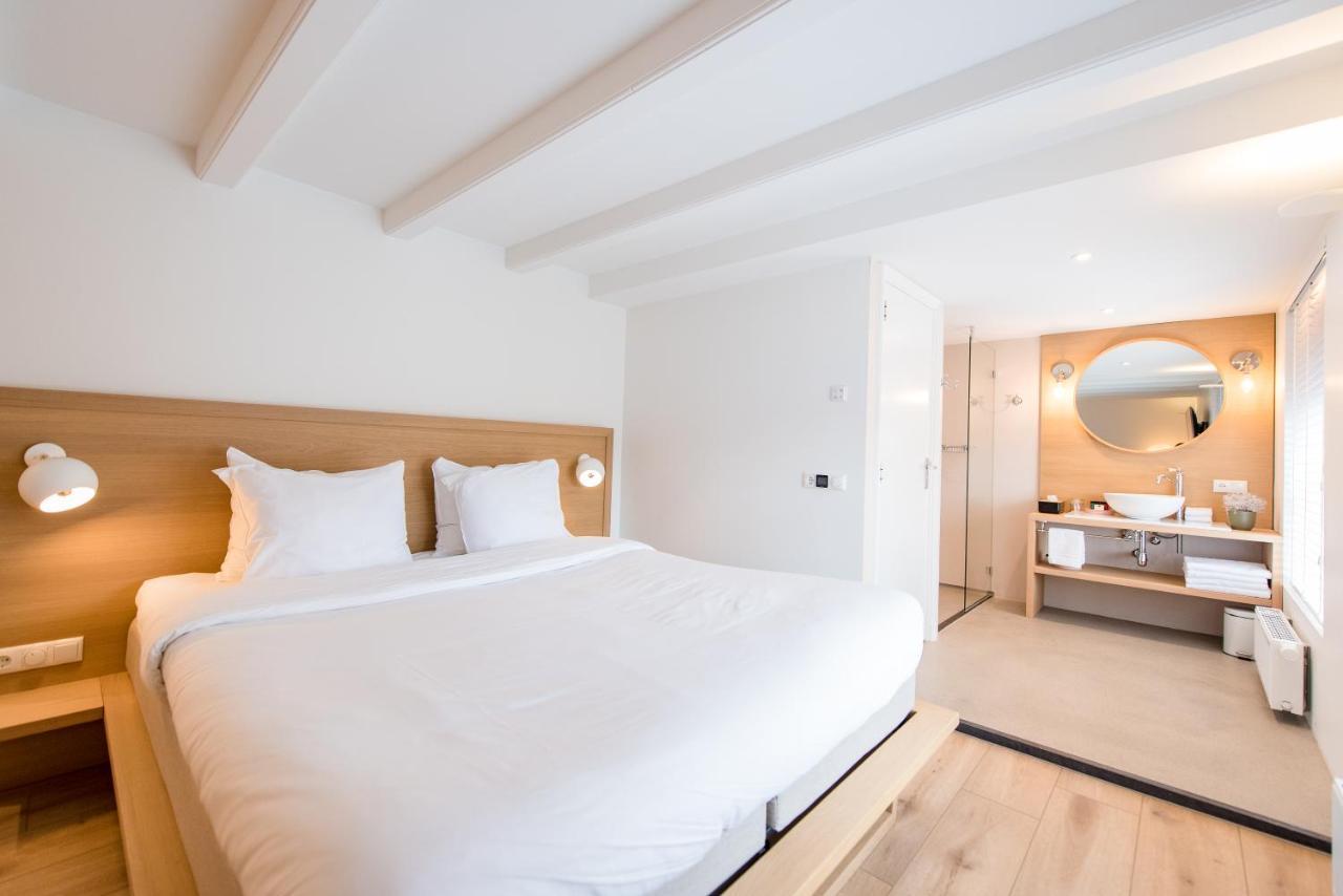 Fietshotel Zee Van Tijd Holwerd Bagian luar foto